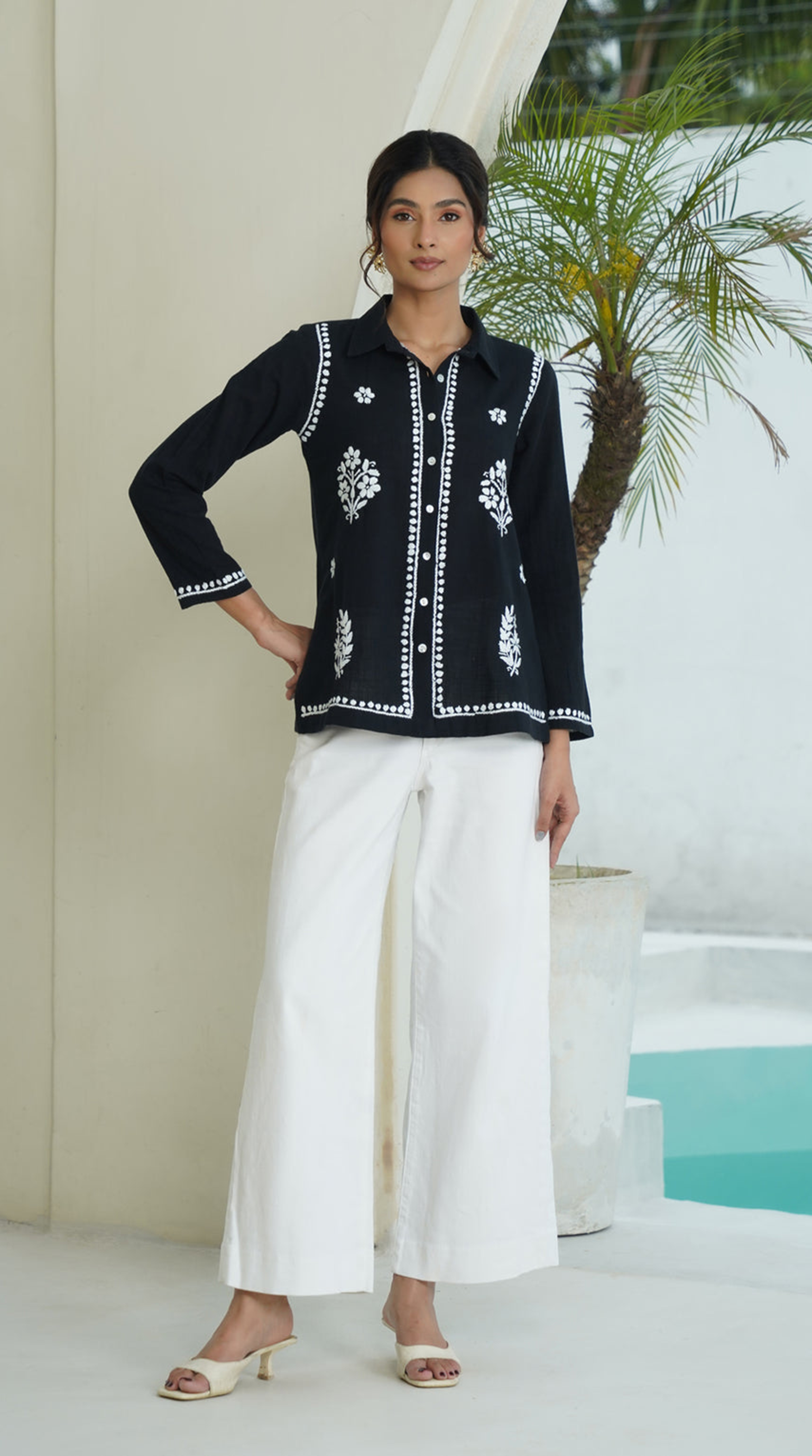 Black embroidered shirt with white palazzo trousers — Feyre